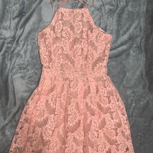 Fully embroidered cocktail dress with a tie neck